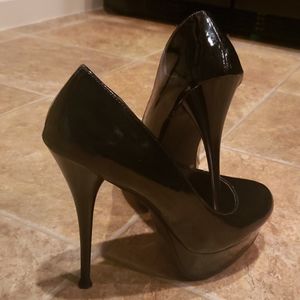 Black platform pumps